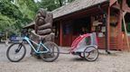 Mountain bike with a buggy trailer at Go Ape